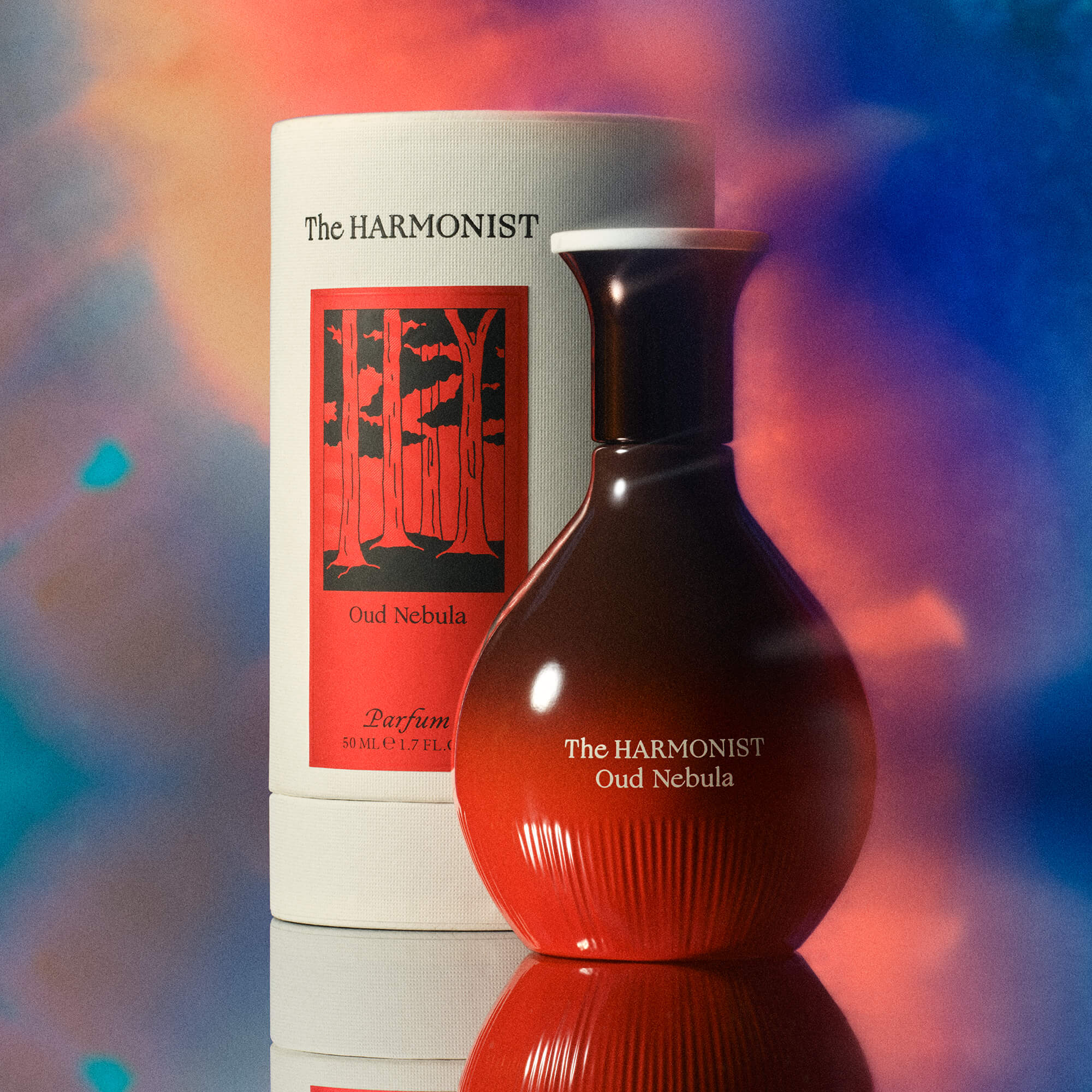 Red gradient bottle of 'The Harmonist Oud Nebula' perfume with forest-themed packaging against a colorful background.